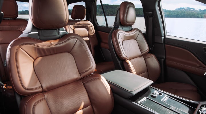 The front row's Perfect Position Seats in a 2024 Lincoln Aviator® Reserve model with Ebony Roast interior | White's Canyon Motors - Lincoln in Spearfish SD