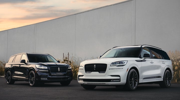 Two Lincoln Aviator® SUVs are shown with the available Jet Appearance Package | White's Canyon Motors - Lincoln in Spearfish SD