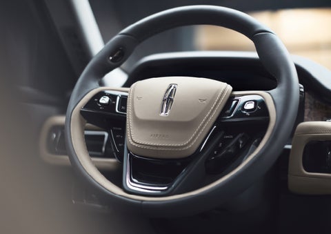 The intuitively placed controls of the steering wheel on a 2024 Lincoln Aviator® SUV | White's Canyon Motors - Lincoln in Spearfish SD