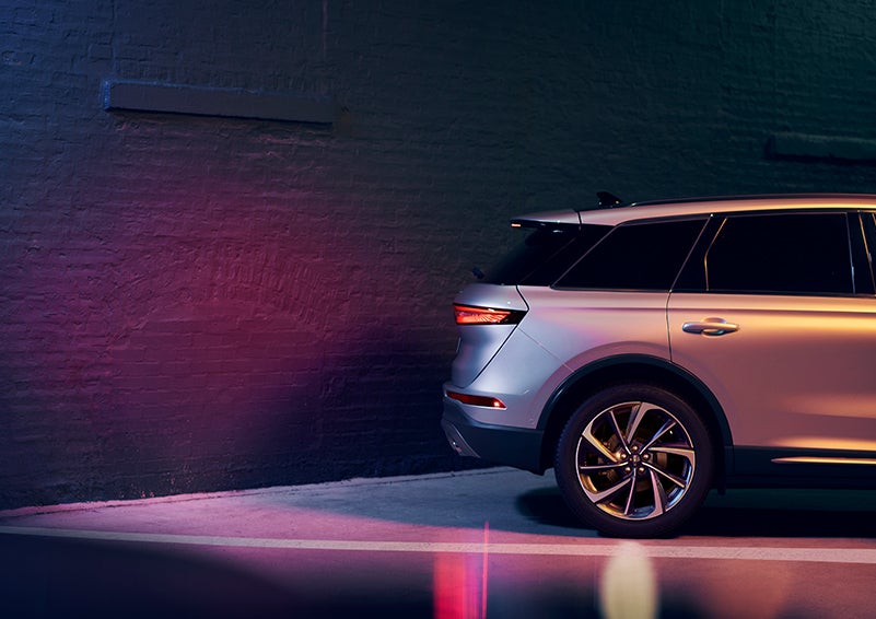 A 2024 Lincoln Corsair® SUV is shown backing up toward a wall. | White's Canyon Motors - Lincoln in Spearfish SD