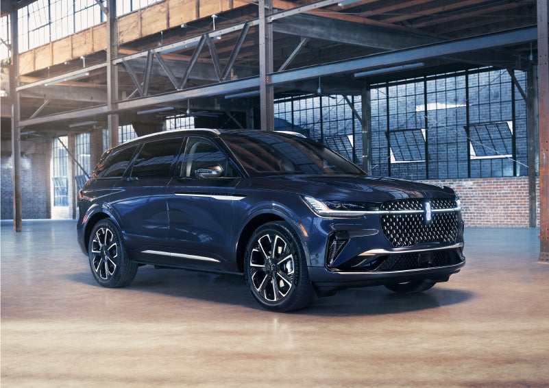 A 2024 Lincoln Nautilus® SUV is parked in an industrial space. | White's Canyon Motors - Lincoln in Spearfish SD